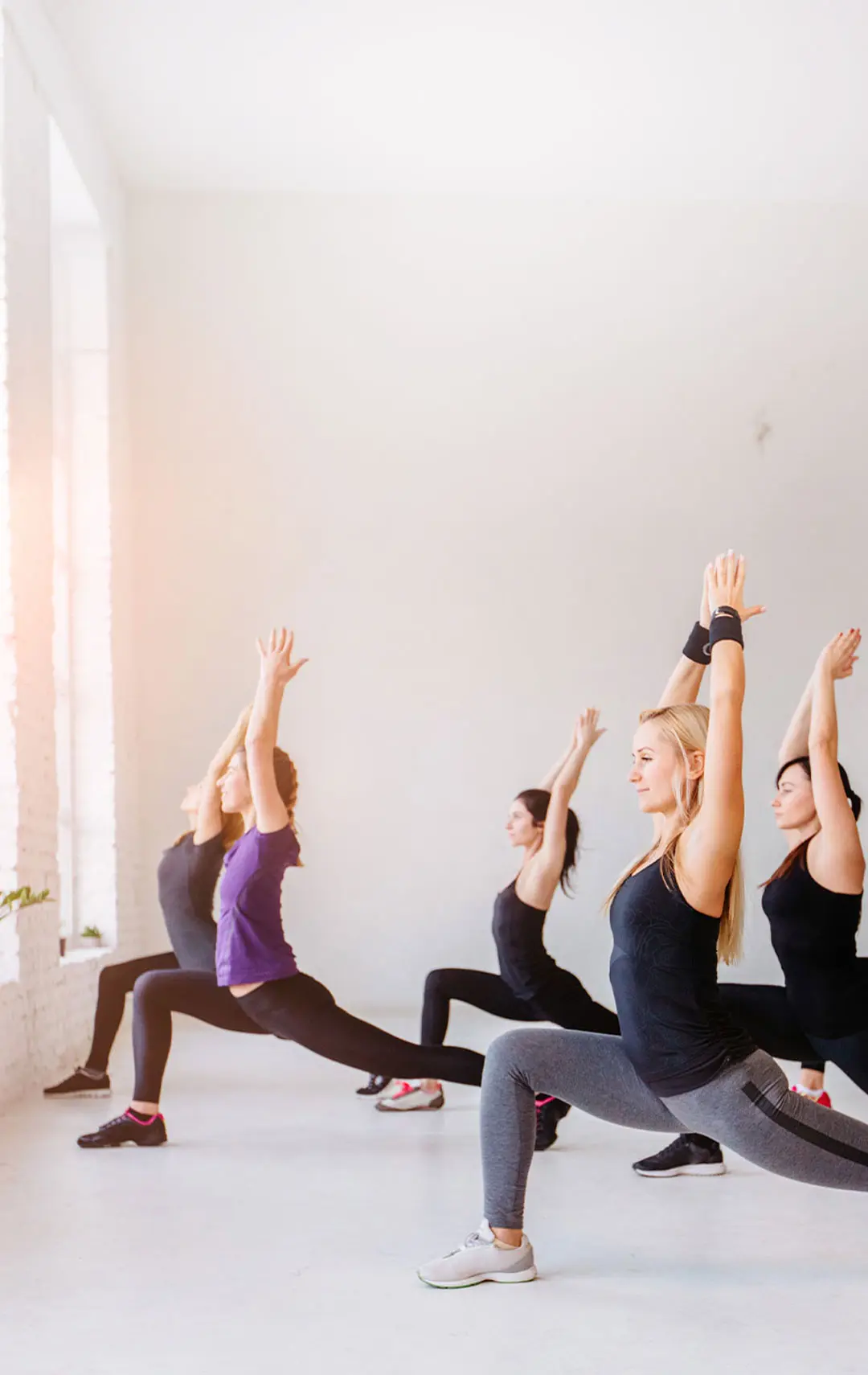 Women doing fitness training exercises at Herspace Fitness Studio - Mobile